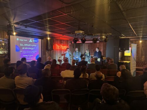 View of attendees and panel at the jaam and edge tech AI event