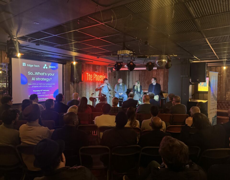 View of attendees and panel at the jaam and edge tech AI event